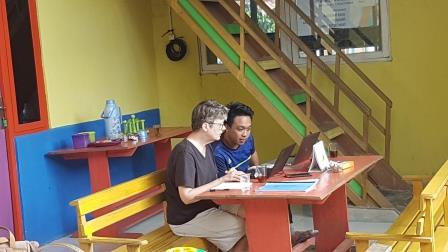Engga and Mary working on an Enggano text