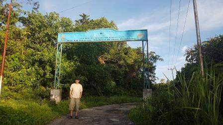 Wayan at the entrance to Meok